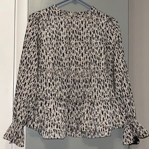 Boutique brand women’s high neck blouse. Tan and black design